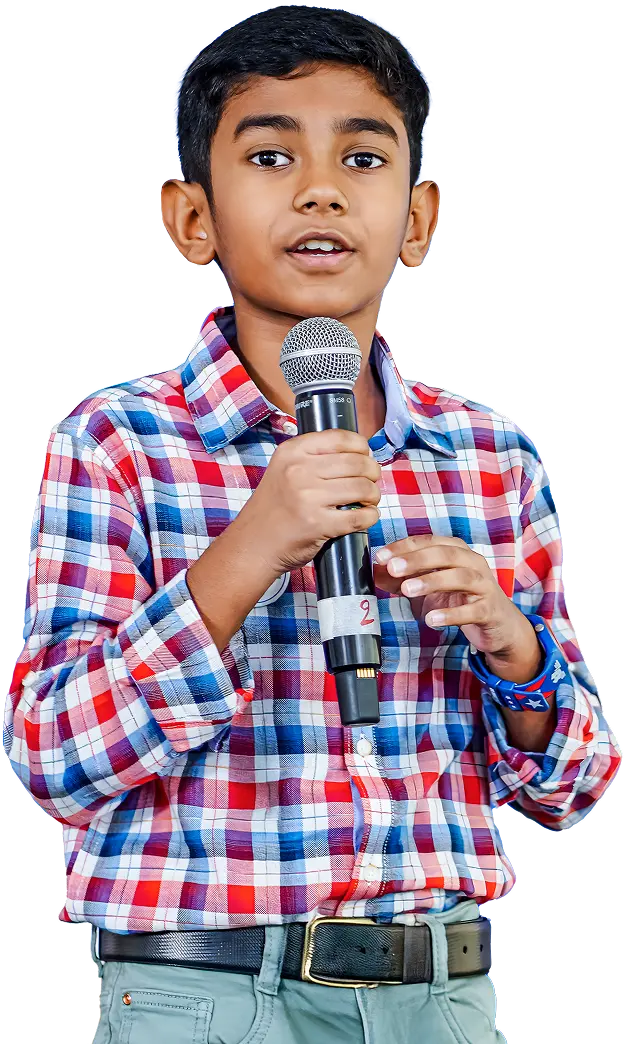 Athvik Amith Kumar – 11-Year-Old Founder of ZOZOconnect on stage with microphone